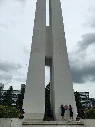 Sec 2 student examining national monument.jpg